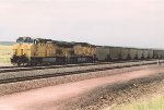 Loaded coal train rolls south